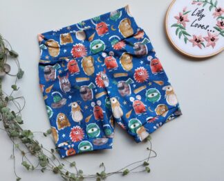 A pair of handmade childrens shorts in a monsters design.
